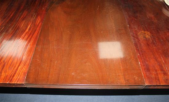 An early 19th century mahogany extending twin pillar dining table, Extended 10ft x 4ft 9.5in. x 1ft 1.5in.